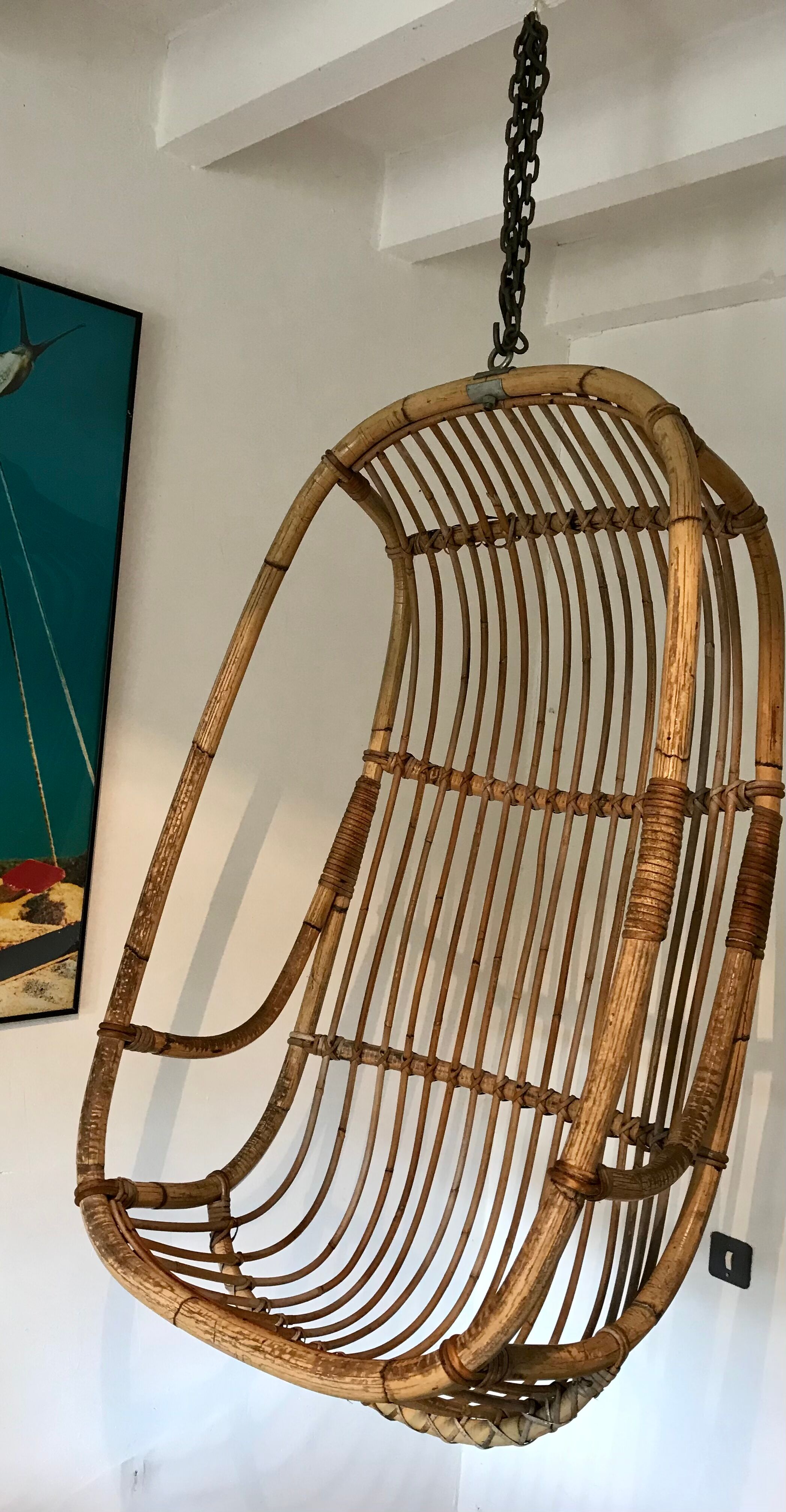 Vintage chair suspended in rattan