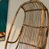 Vintage chair suspended in rattan