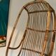 Vintage chair suspended in rattan