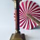 Old candle holder in brass and wood