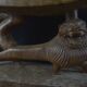 Togolese ethnic stool in carved exotic wood.