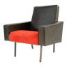 Vintage black skaï armchair and red moumoute from the 1960s