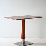 Mahogany bar table with steel base and carved stem