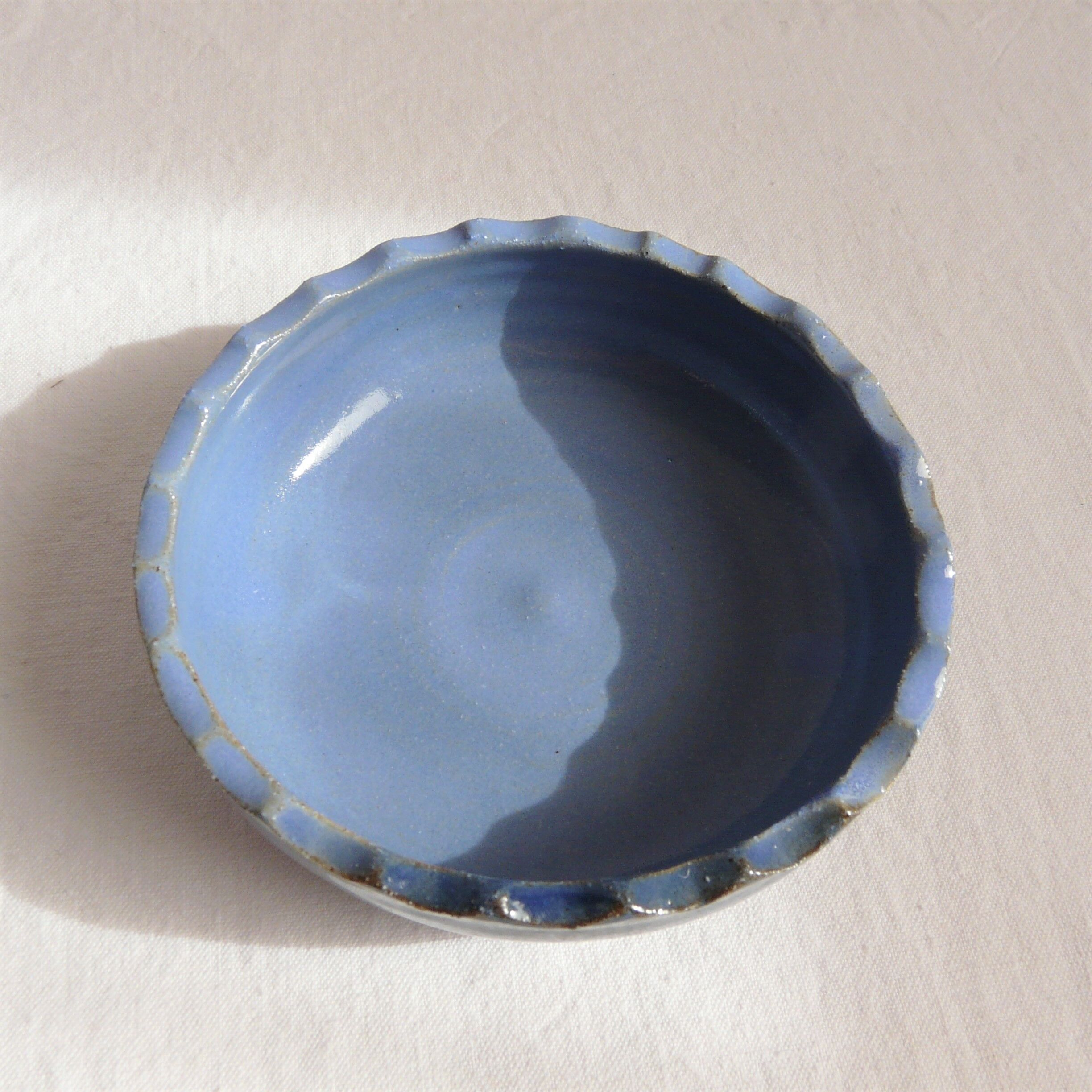 Blue enamelled ceramic cup