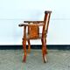Hand stabbed teak armchair