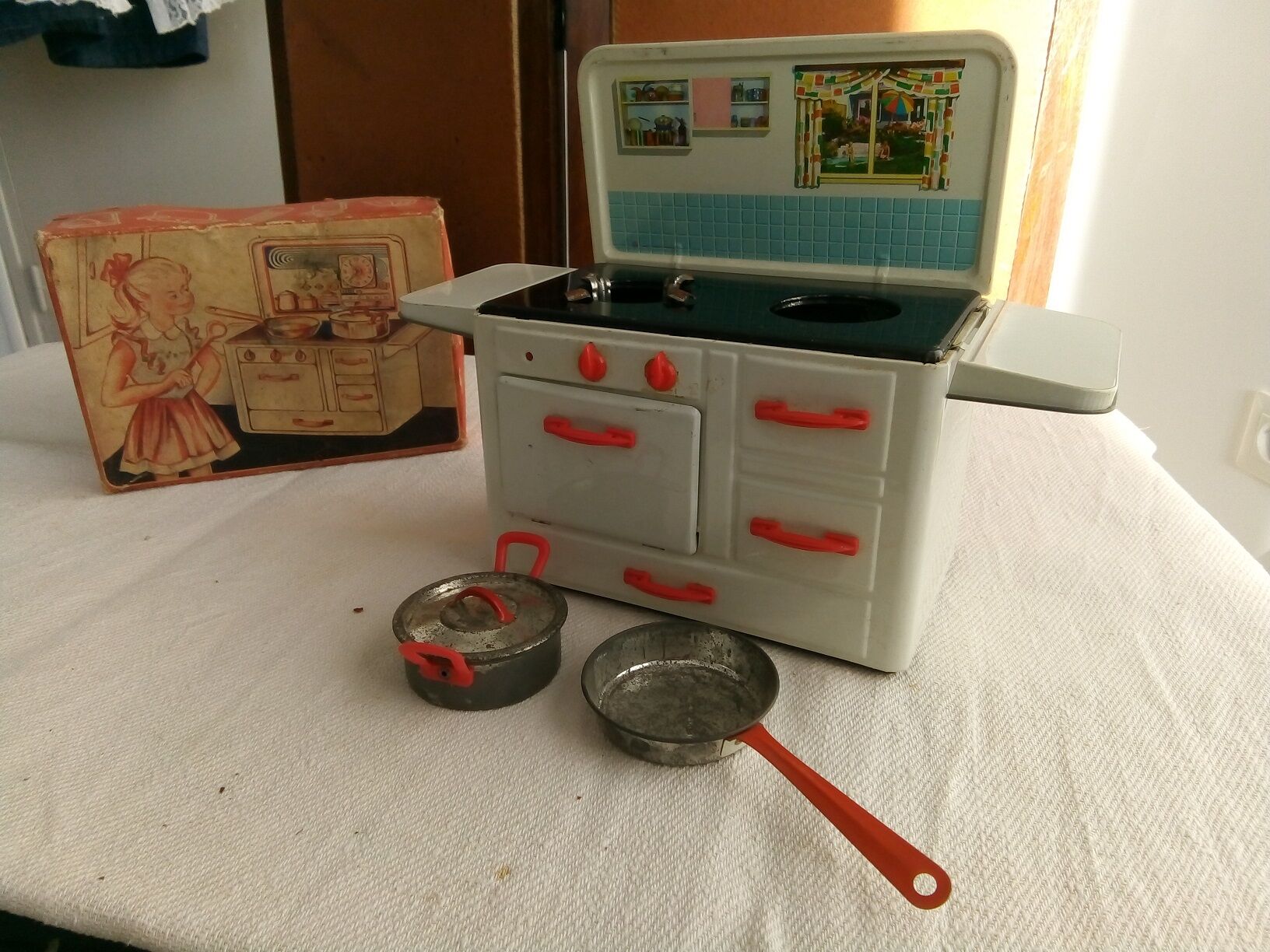 Toy old cook doll sheet metal