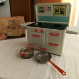 Toy old cook doll sheet metal