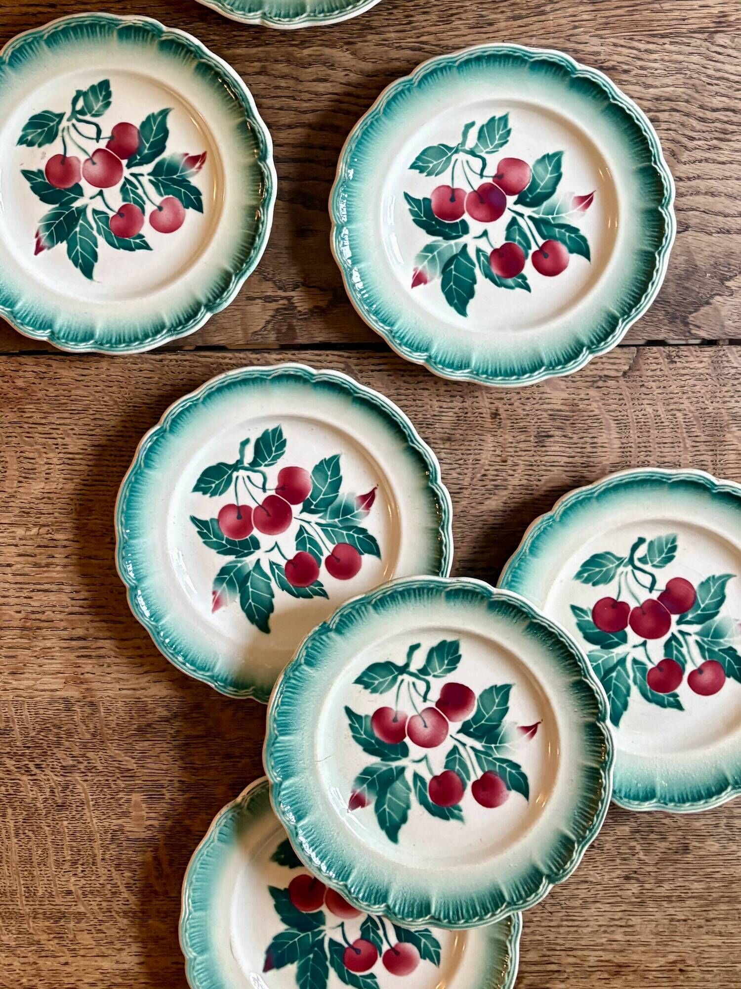 Set of 7 vintage Badonvilier dessert plates.