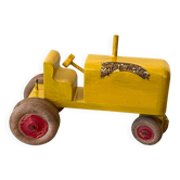 Wooden tractor from the French brand "Ateliers du Père Noël"