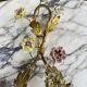 Pair of Maison Baguès wall lights with porcelain flowers, early 19th century