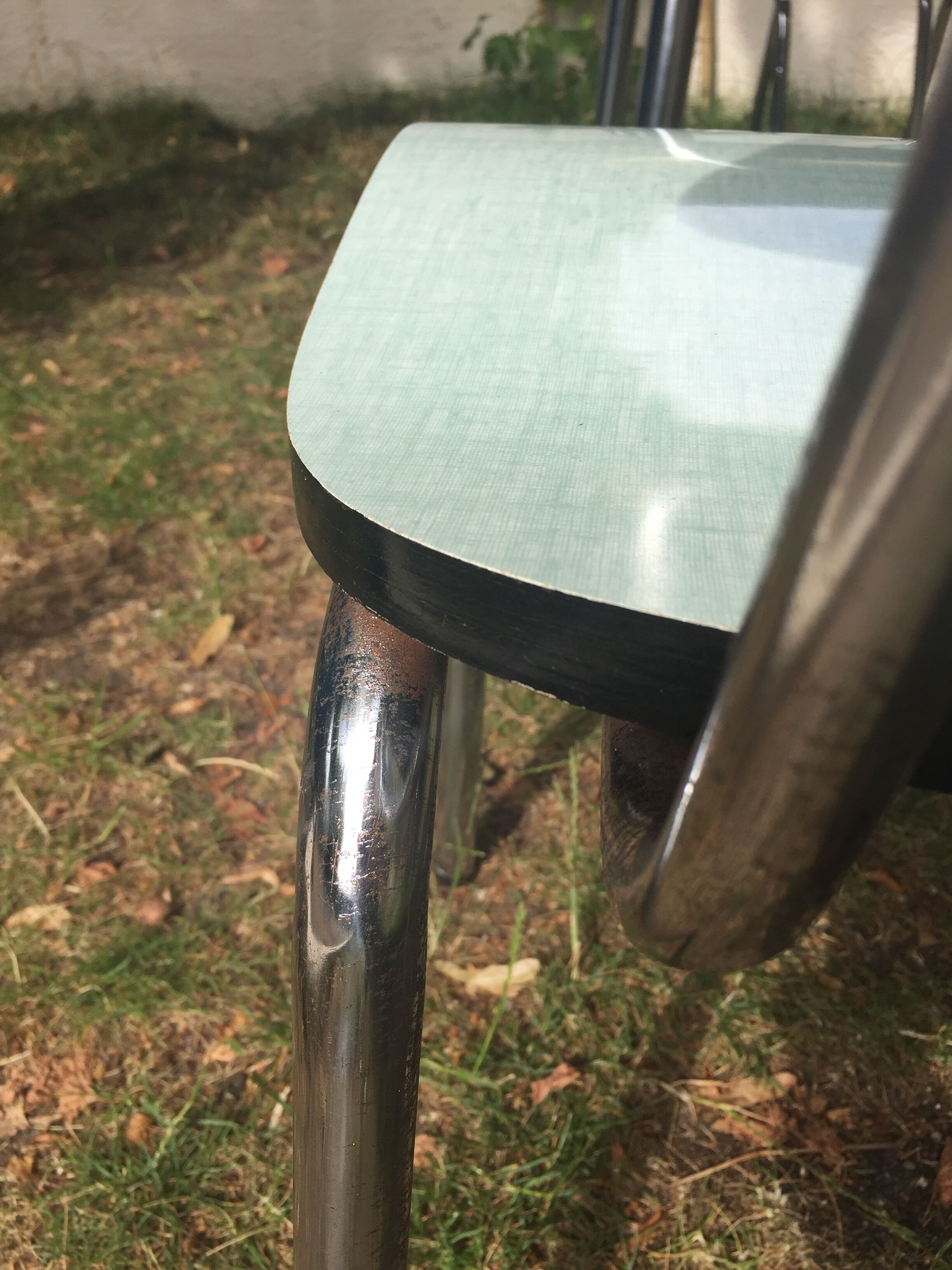 Table and 4 green water formica chairs 60's