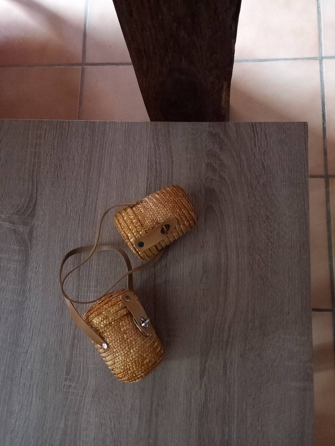 2 small rattan and leather baskets