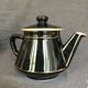 Black and gold ceramic coffee maker
