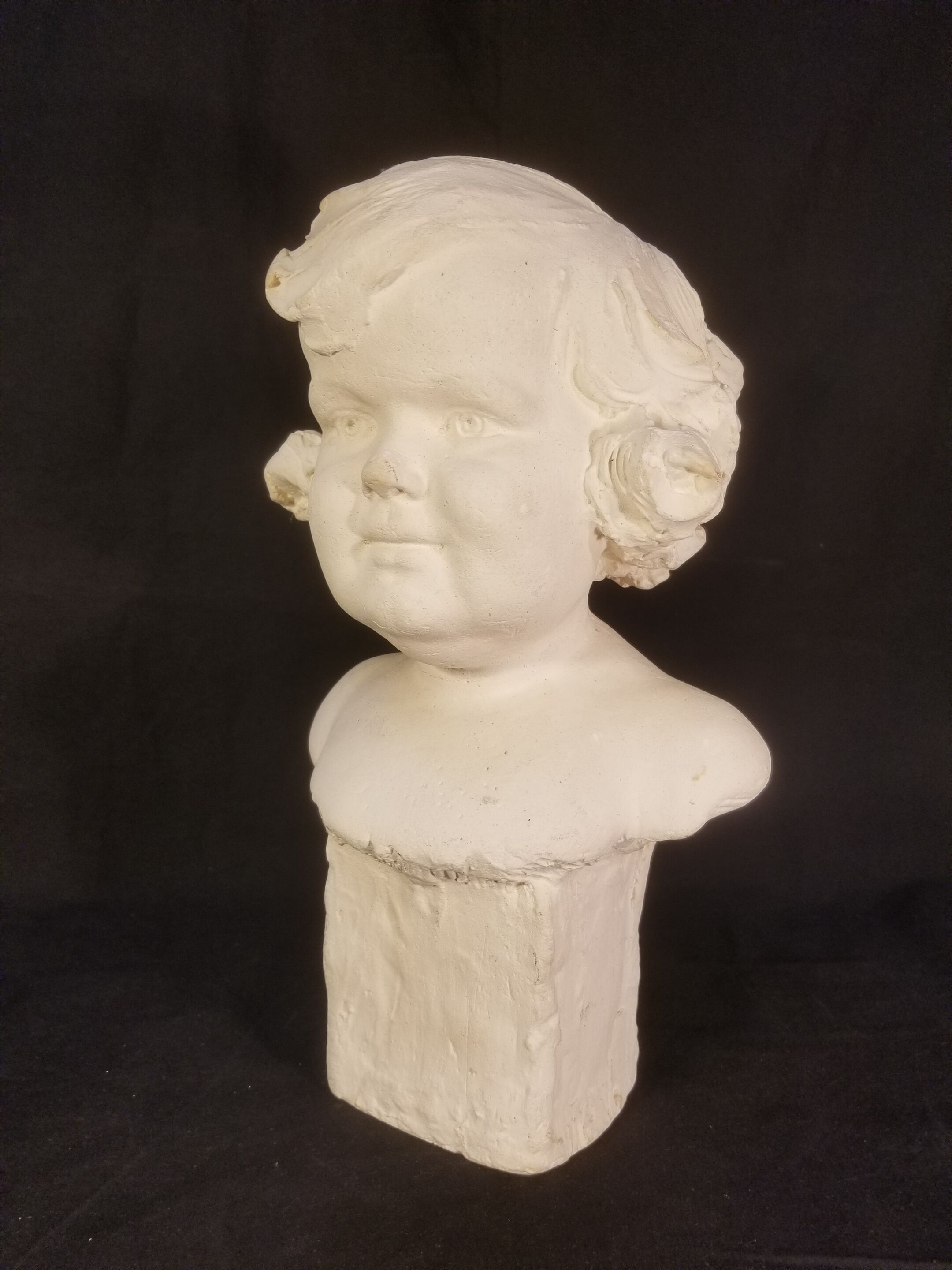 Old plaster bust - The gracious child