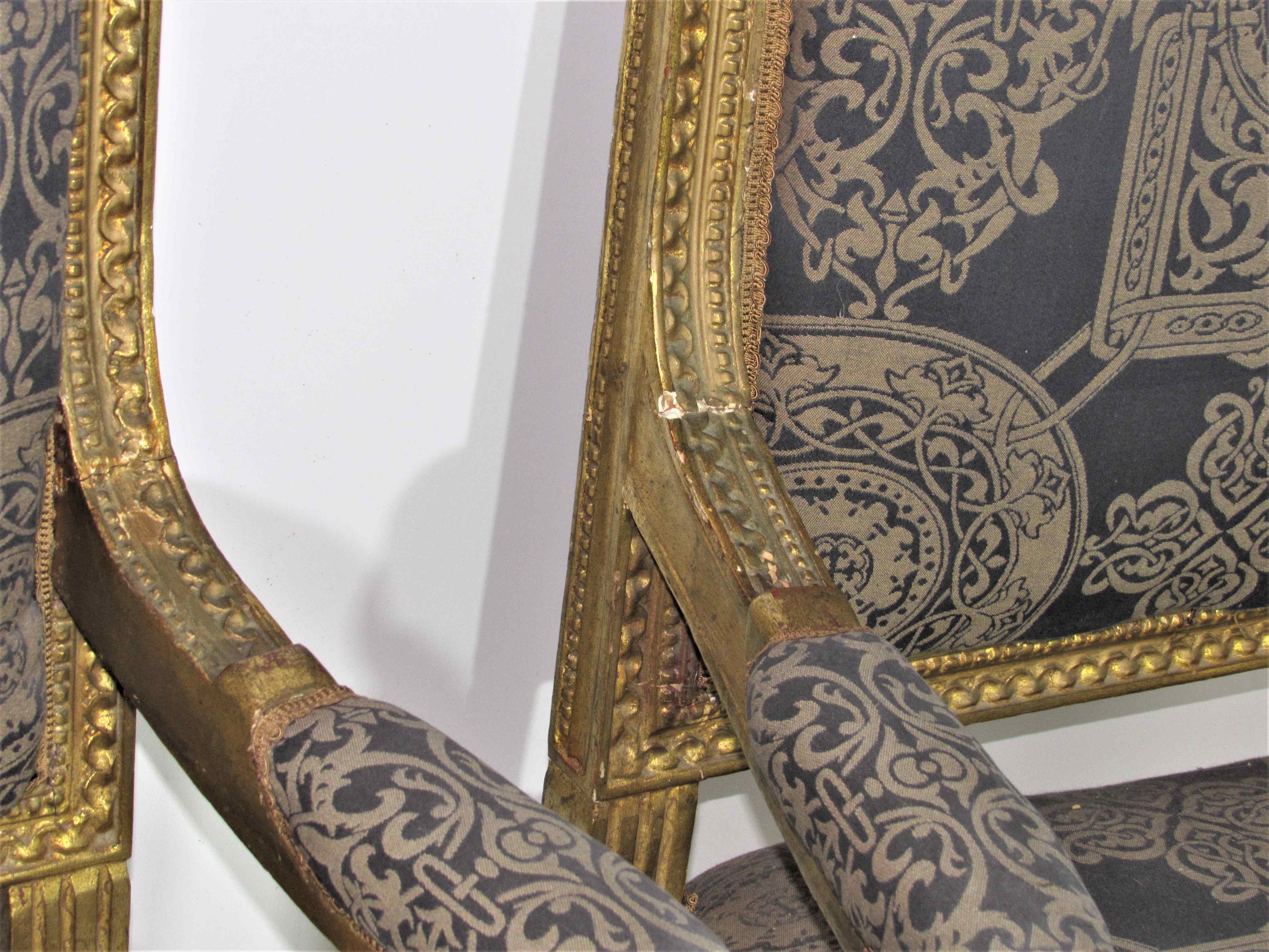 4 armchairs and a gilded wooden sofa Louis XVI style