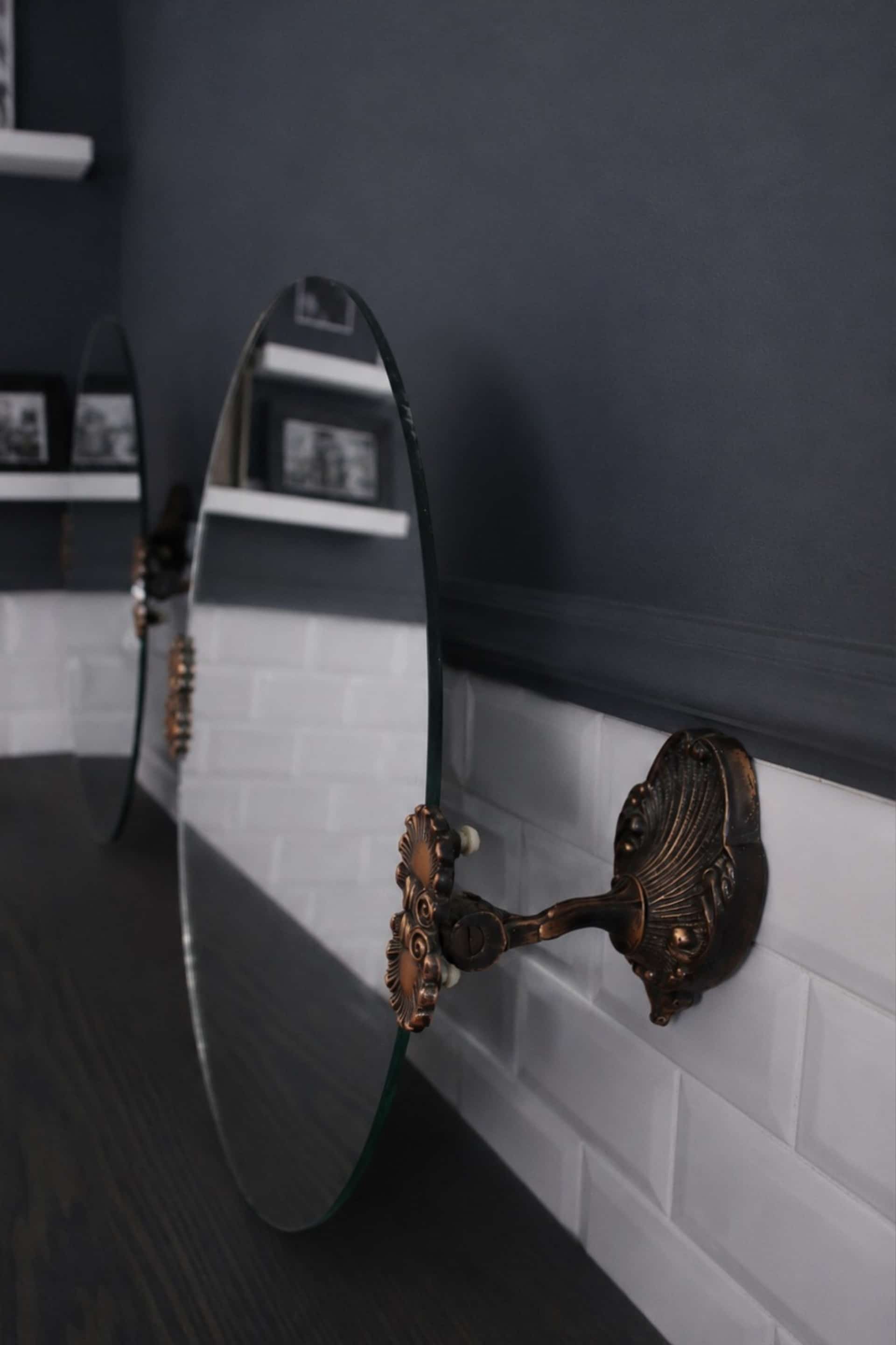 2 round mirrors made of copper alloy, 1940s-1950s