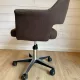 Vintage Mid-Century brown office chair with wheels from the 1970s.