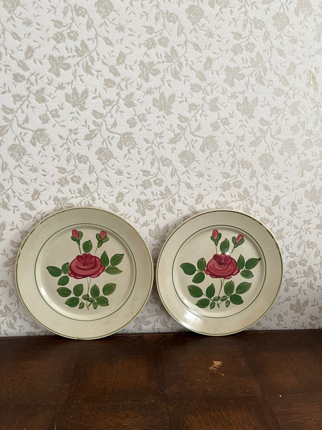 Two pink earthenware plates