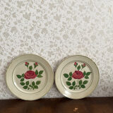 Two pink earthenware plates