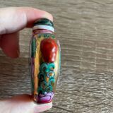 Small bottle for tobacco