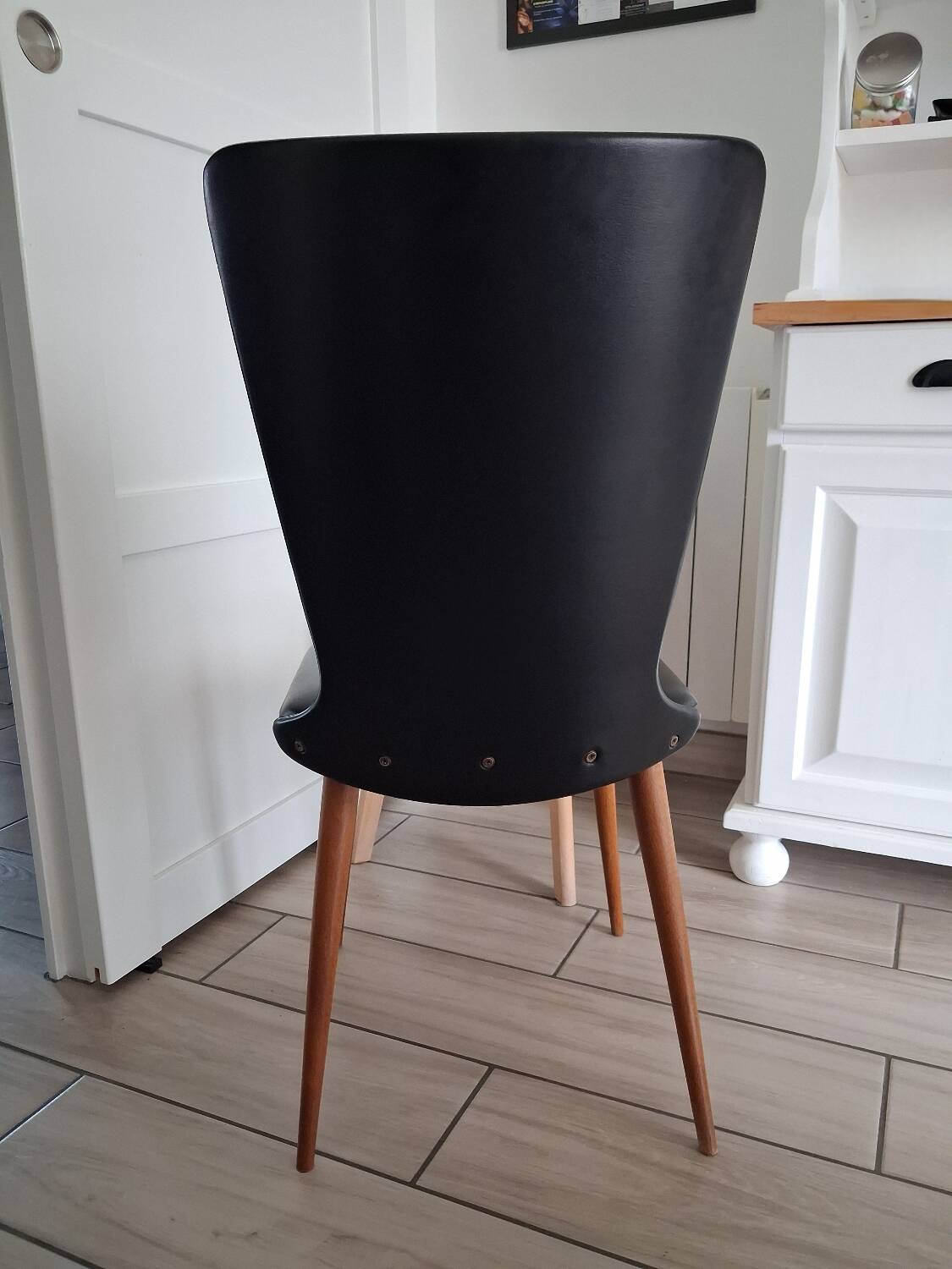 4 black Baumann style chairs