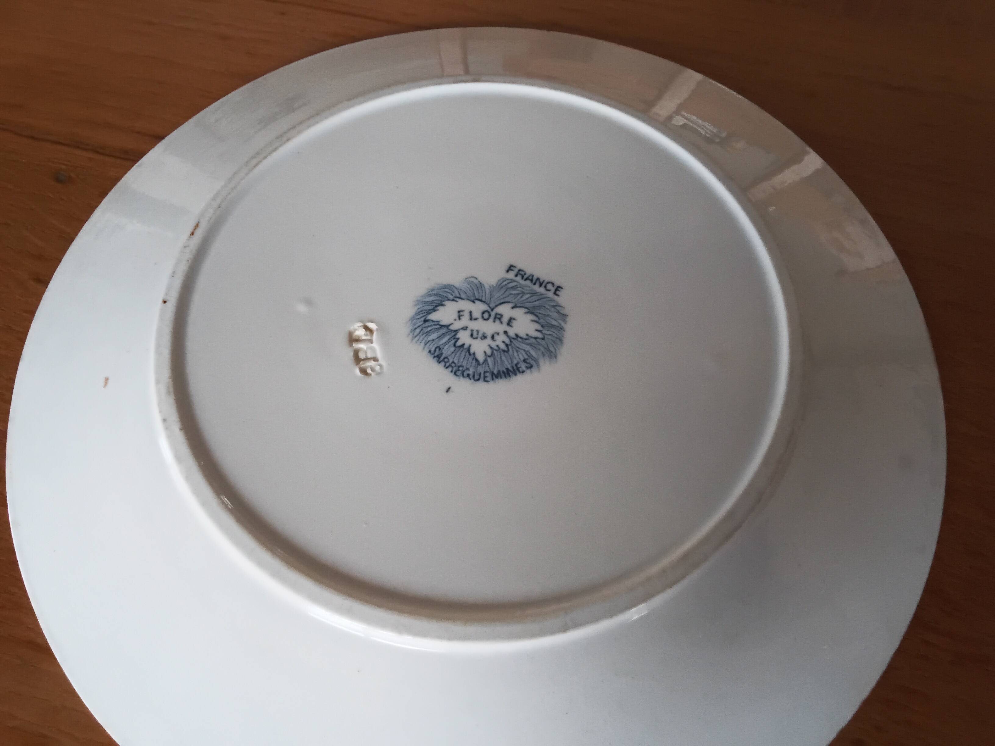 Two antique flat plates from Sarreguemines.