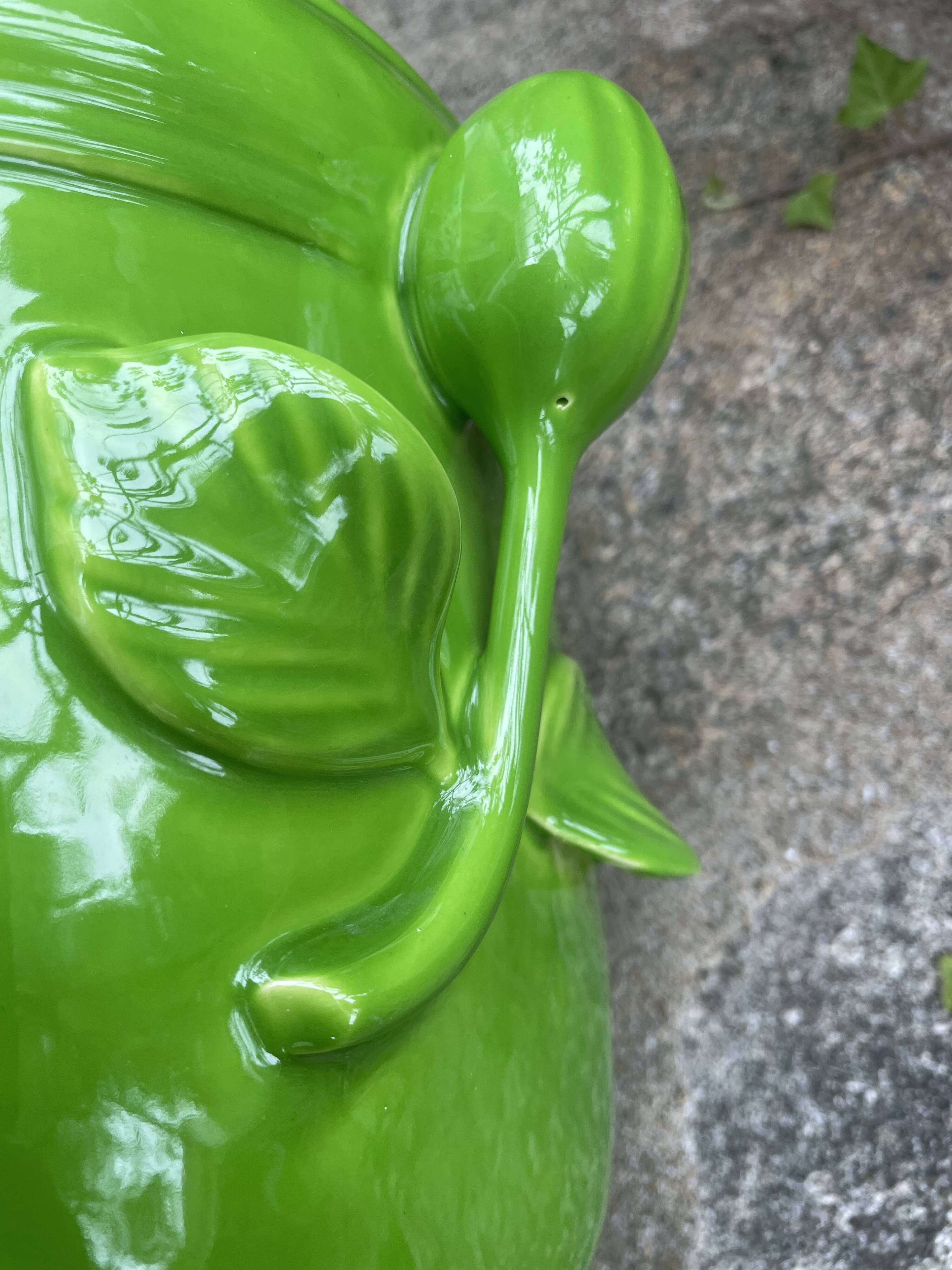 Glazed green pot cover in the style of Moreau Bourg earthenware