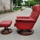 Red leather relax armchair and pouf