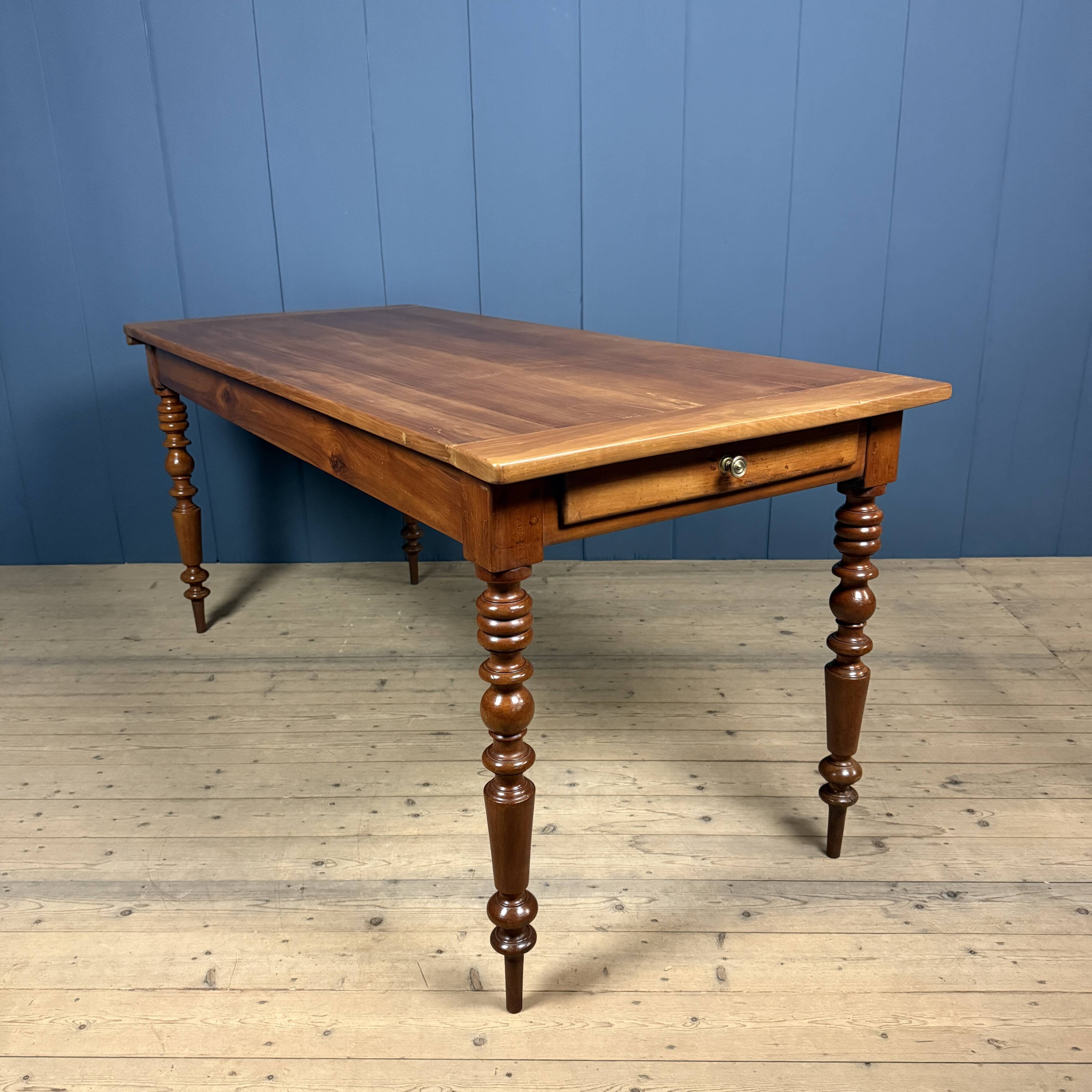 Antique cherry wood dining table from France.