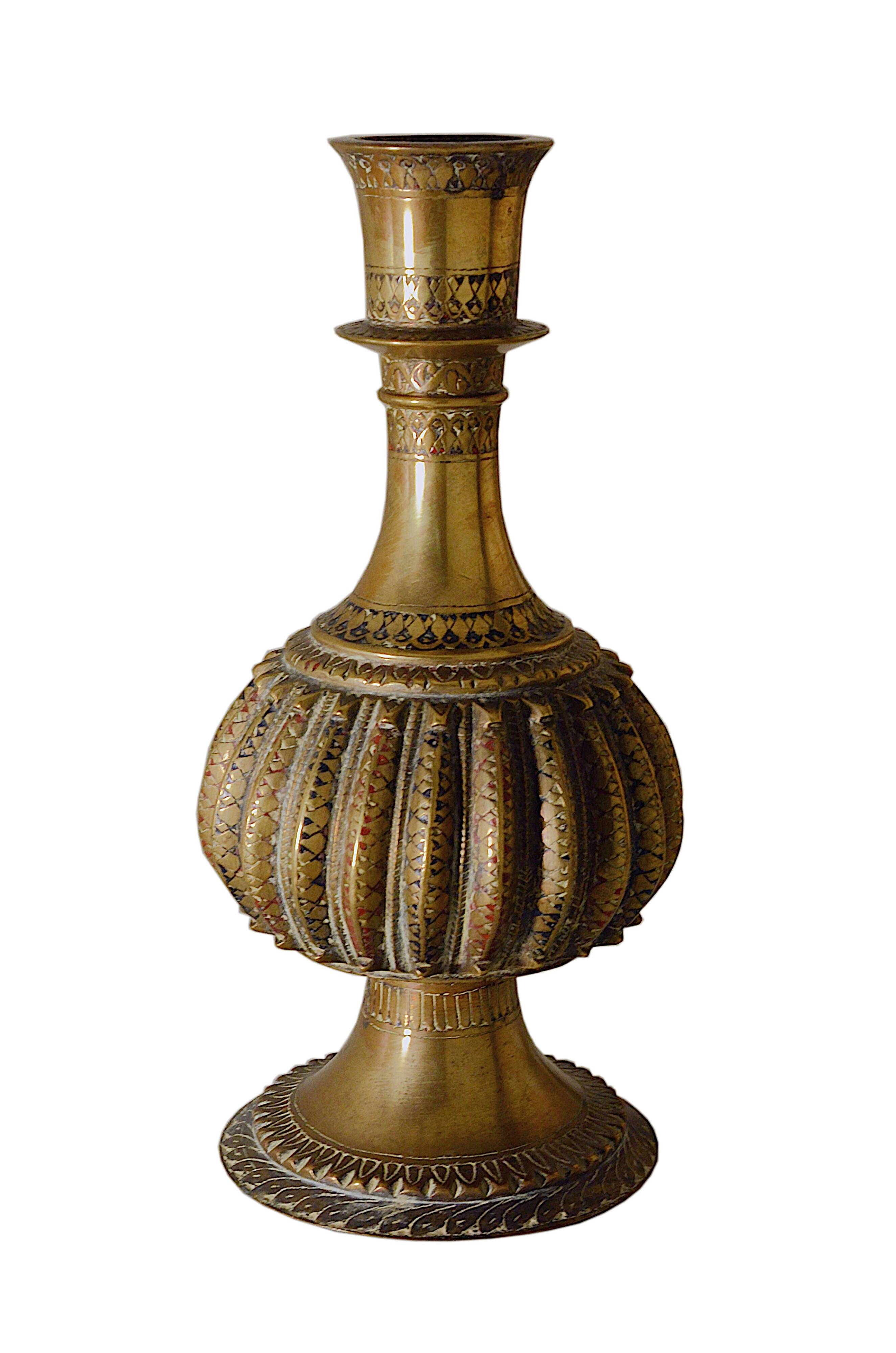 Antique bronze vase with black and red geometric patterns, 13x25cm.
