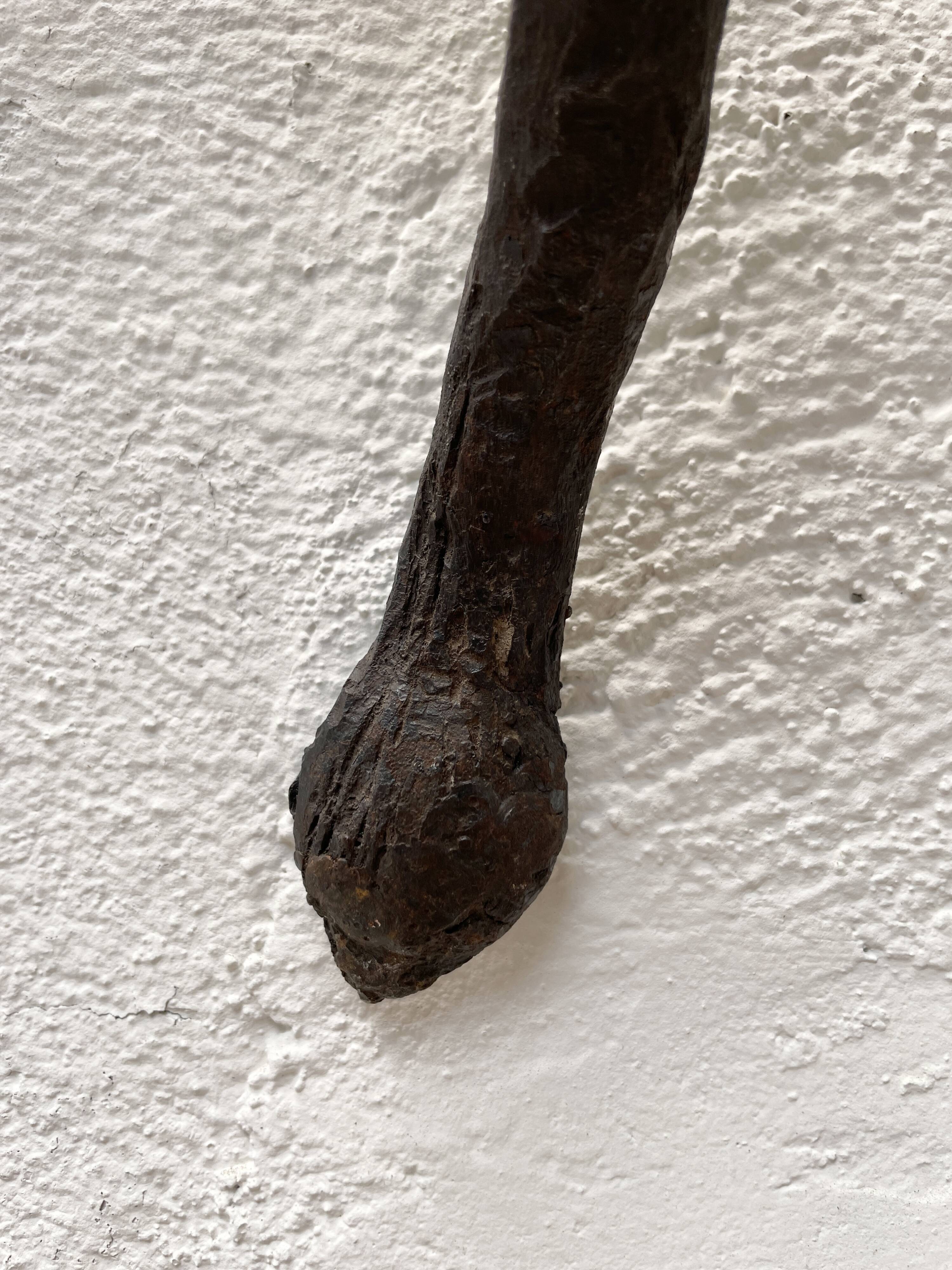 Wall lamp in wrought iron.