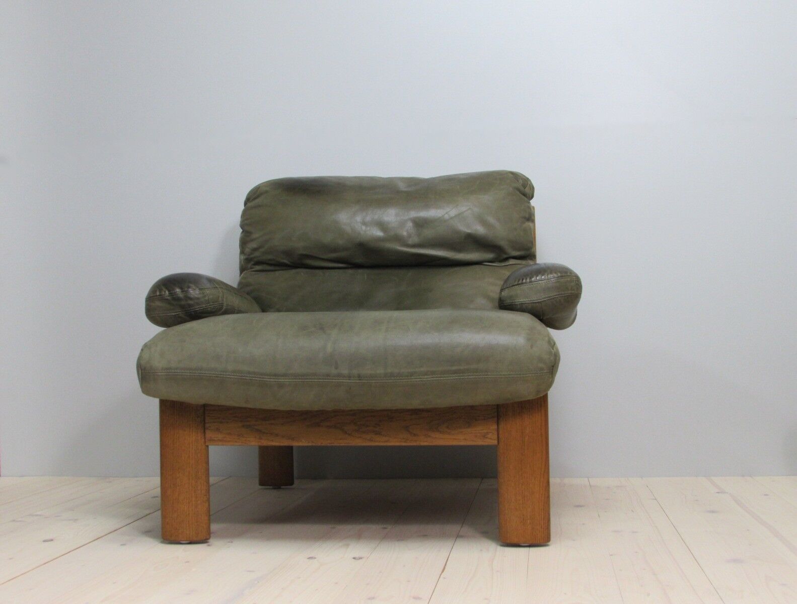 Armchair and footstool - green leather - 1960s