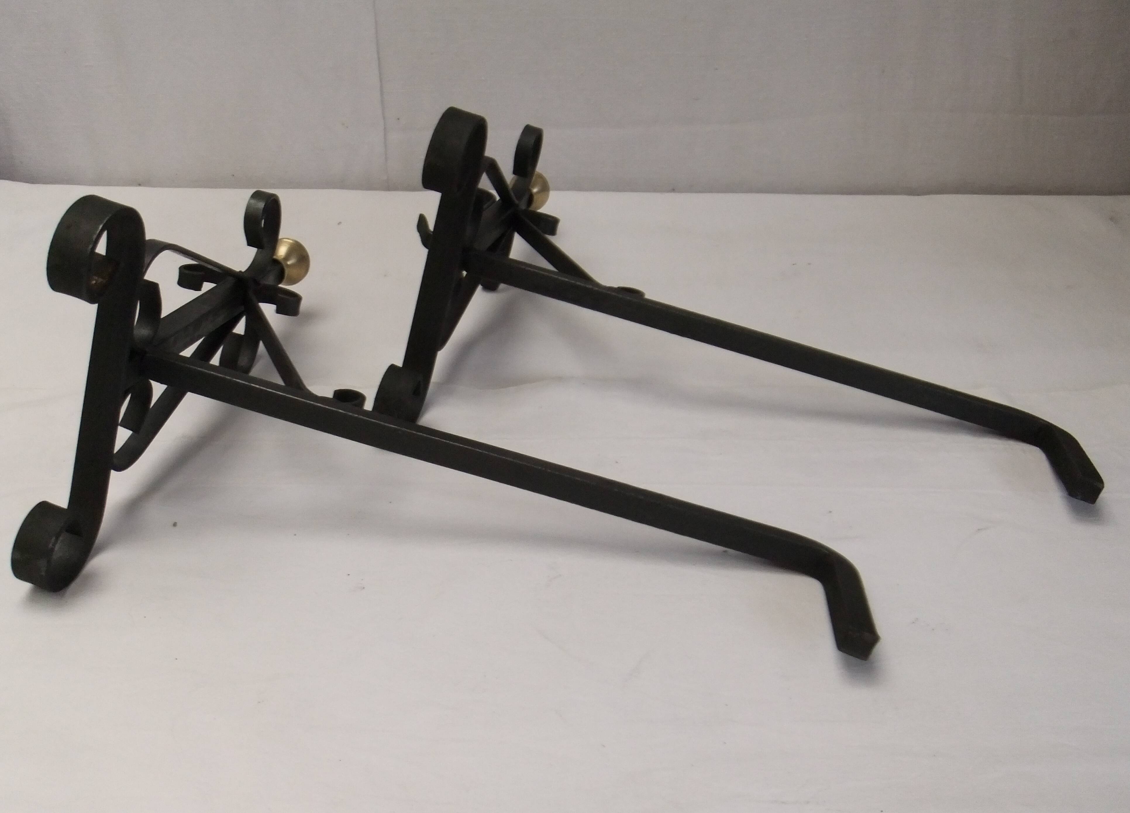 Antique pair of cast iron andirons wrought iron and bronze fireplace accessory