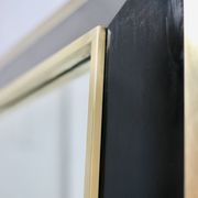 Jean-Claude Mahey mirror. Black lacquered wood and gold metal. 1970