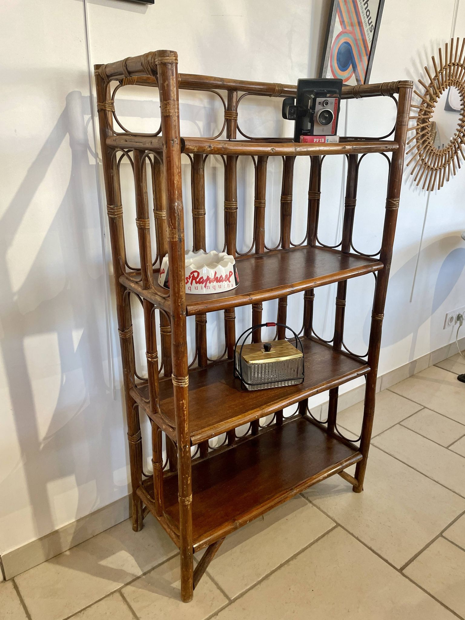 Shelf on rattan and bamboo legs from the 70s