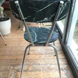4 chairs in very dark green formica marble effect