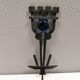 Vintage wall candle holder in wrought iron and hard pressed blue glass.