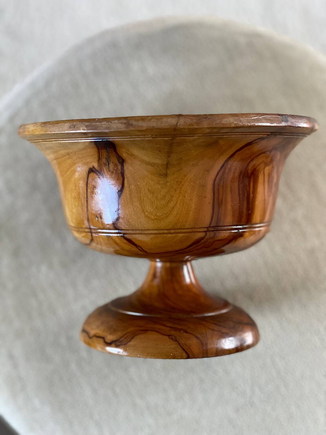 Empty pocket in olive wood
