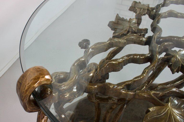 Sculptural bronze and glass coffee table