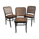 Blackened wooden chairs and cannage around 1980