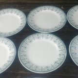 Lot de douze assiettes plates en terre de fer de la faïencerie Moulin des L