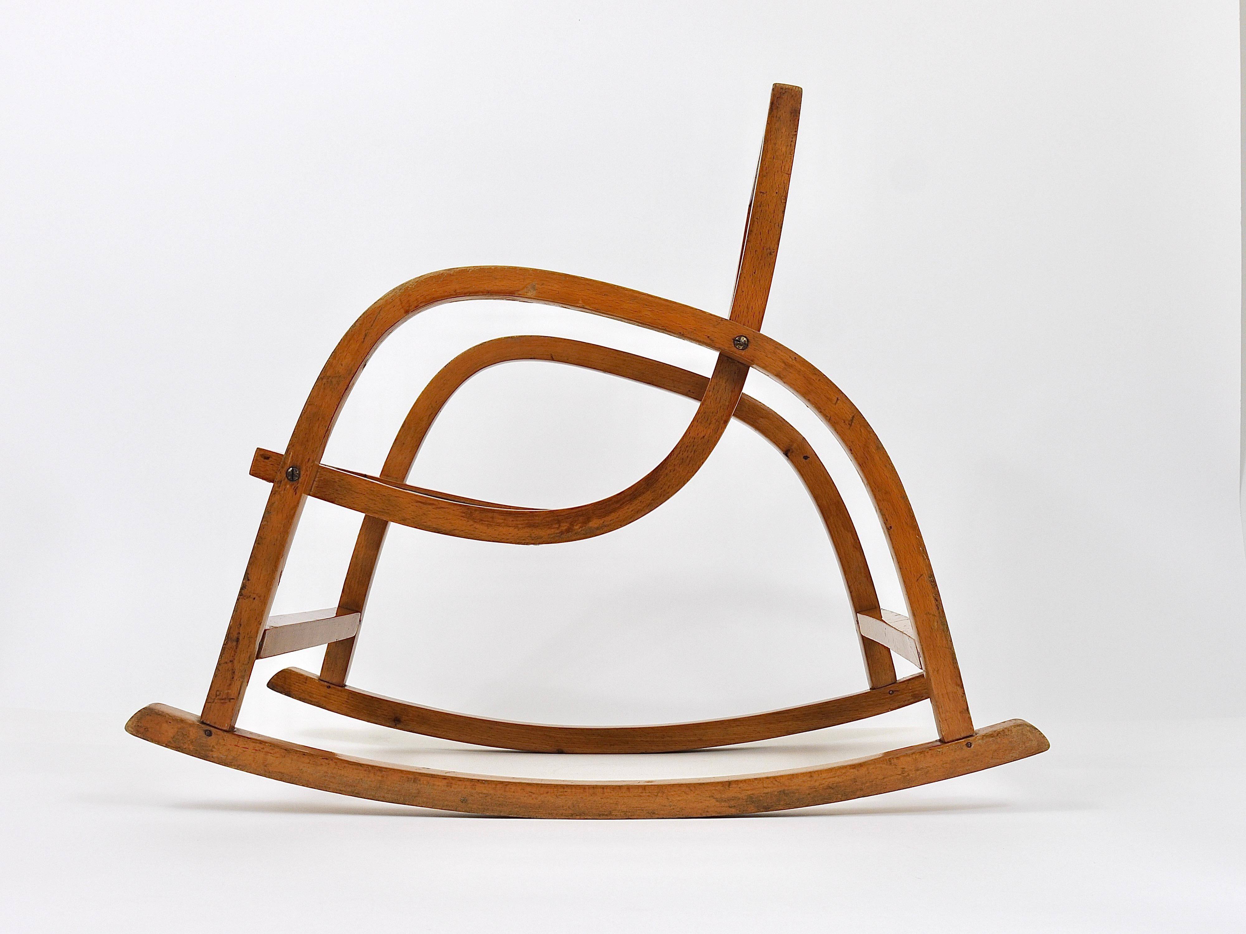 Curved wooden rocking chair for children Bauhaus Brockhage Andrä period, Germany, 1950s