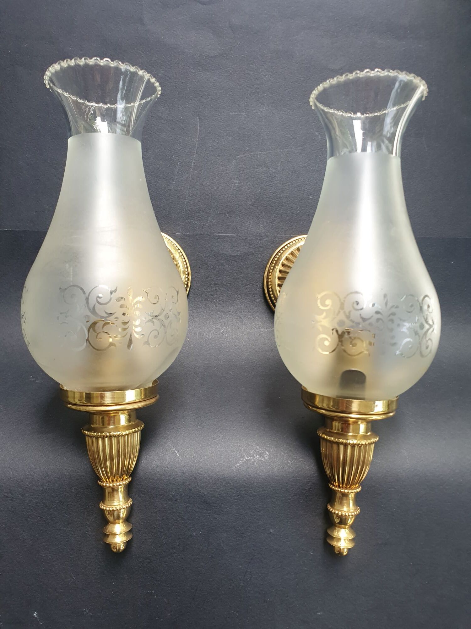 Pair of antique gold wall sconces