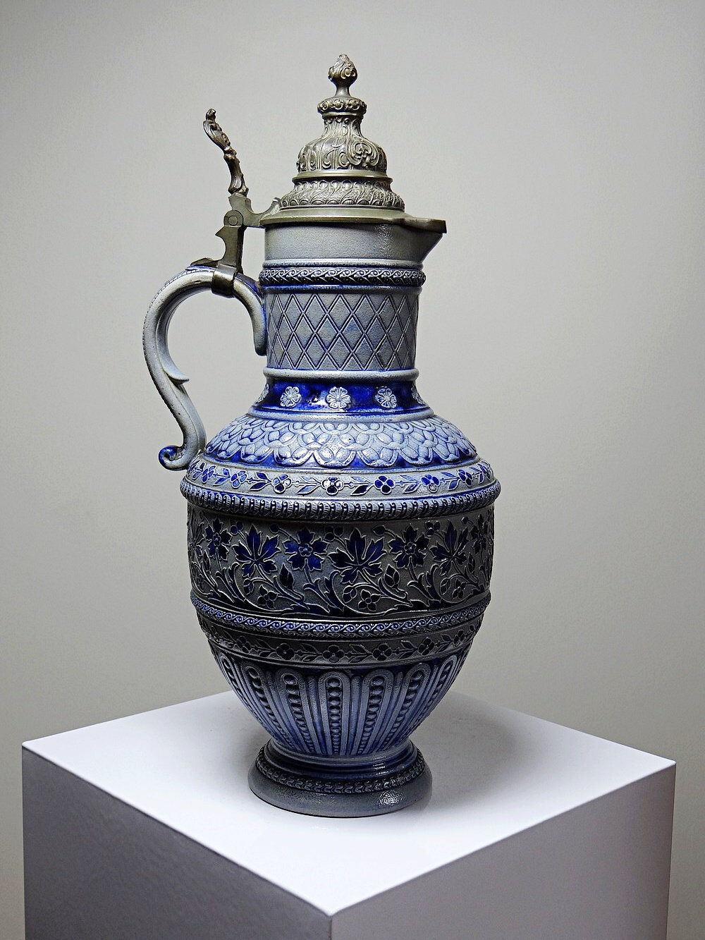 Large salt-glazed stoneware beer jug with tin, Germany, Westerwald type.