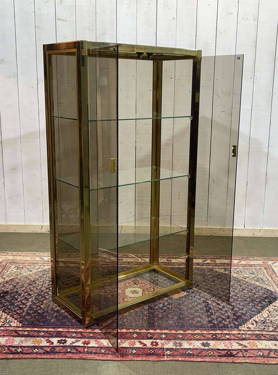 Exhibition showcase in gold-plated chrome and smoked glass - work from the 1980s.