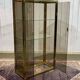 Exhibition showcase in gold-plated chrome and smoked glass - work from the 1980s.
