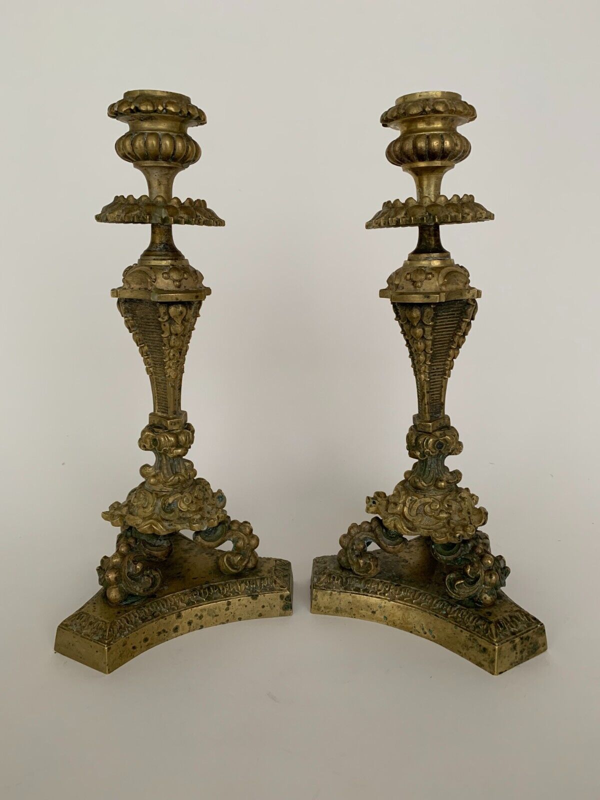Pair of bronze candle holders with neogothic nineteenth chiseling
