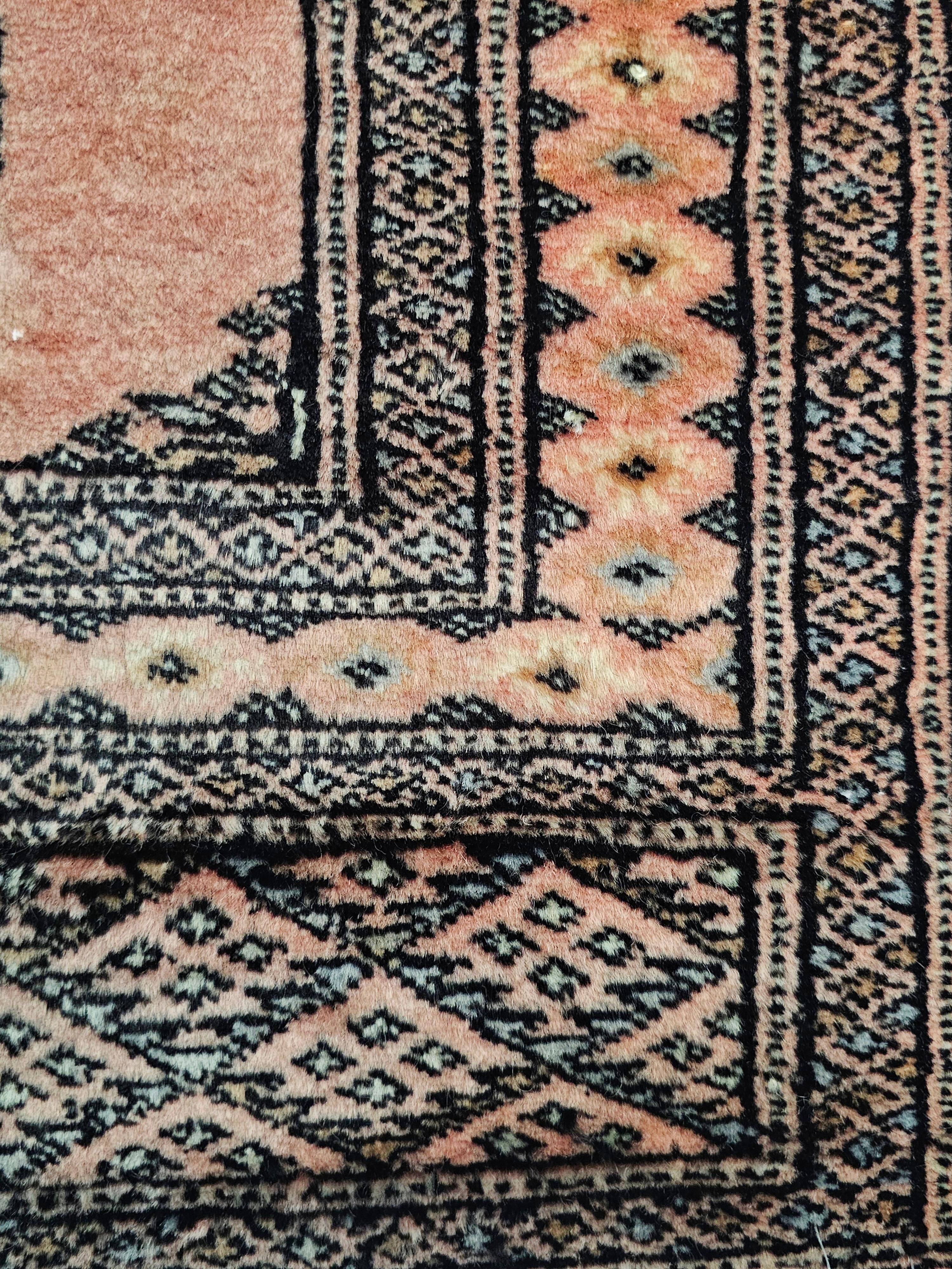 Tapis vintage noué main Bokhara Pakistan années 1950
