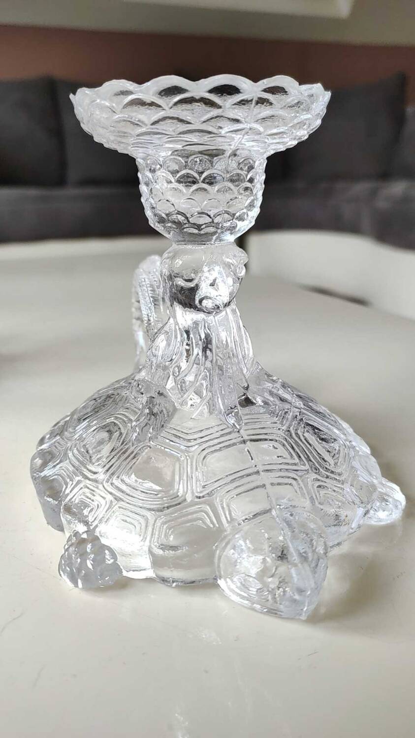 Pair of hand candlesticks/glassware from Portieux/Vallerysthal. In molded glass. Zoomorphic form of turtle carrying a griffin on its back.