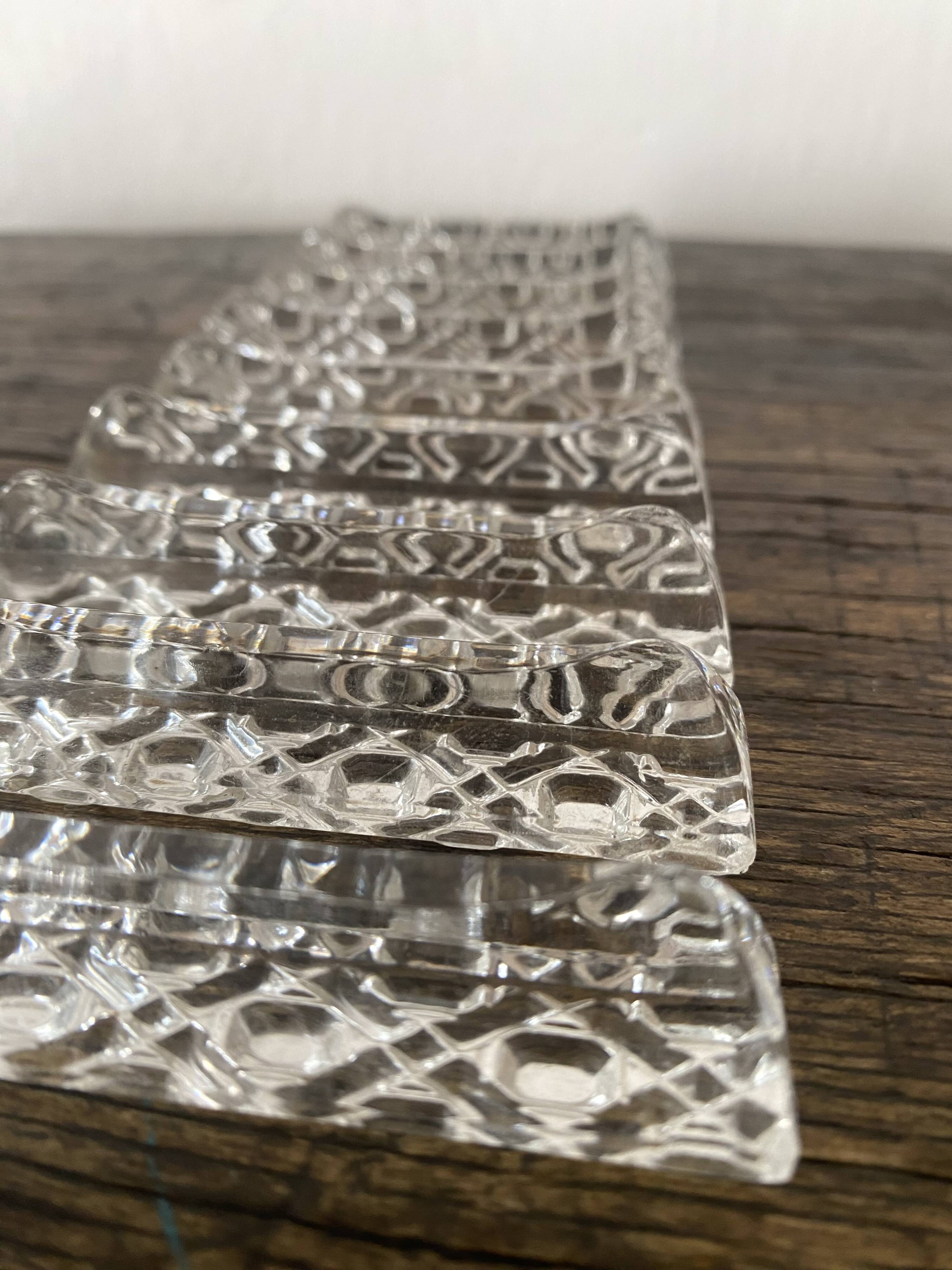 Set of antique glass knife holders